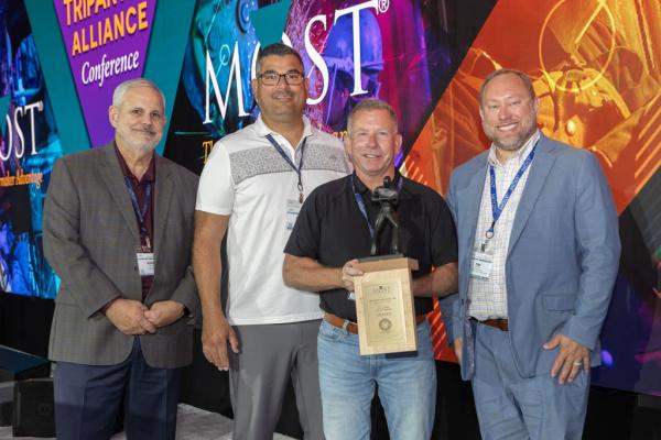 L-363 BM-ST William Mulconnery, second from right, accepts the 2023 Charles W. Jones Award on behalf of the lodge. Left to right are MOST Administrator Mark Garrett, IVP-GL Dan Sulivan, Mulconnery, and IP Tim Simmons. L-363 BM-ST William Mulconnery, second from right, accepts the 2023 Charles W. Jones Award on behalf of the lodge. Left to right are MOST Administrator Mark Garrett, IVP-GL Dan Sulivan, Mulconnery, and IP Tim Simmons.